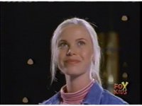 close on kat smiling as she loo...